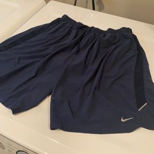 Navy Blue men’s Nike running shorts with liner